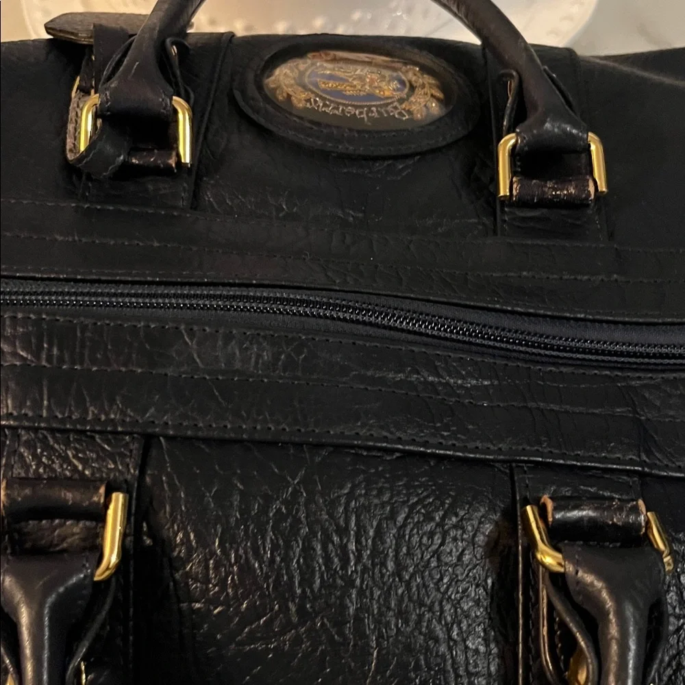 Burberrys Dark Navy Leather Bag with Embroidered Patch